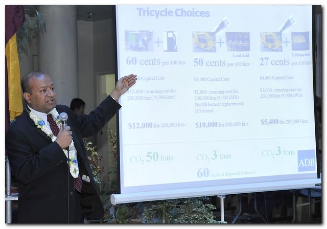 Sohail Hasnie presenting comparative running-cost analysis for electric tricycle options