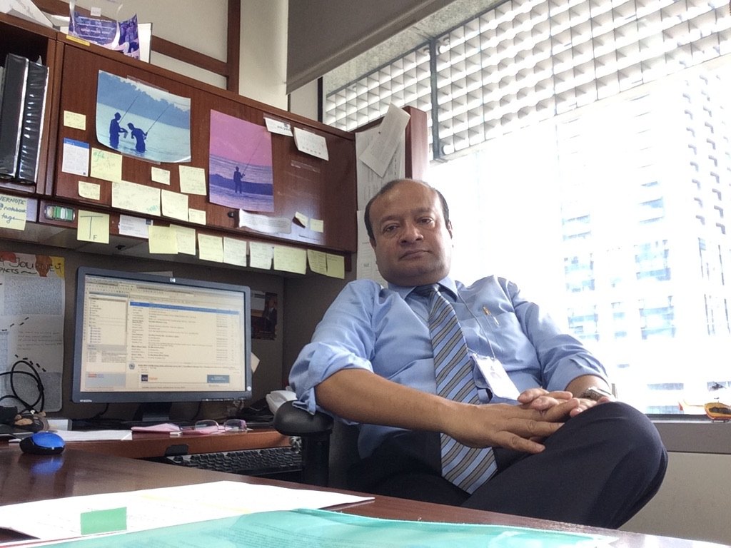 Sohail Hasnie in his ADB office waiting for e-trike visitors